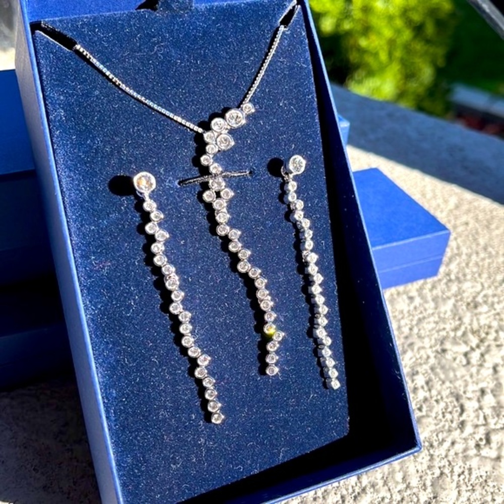 Authentic Swarovski “Impression” set in original box, with certificate